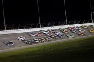 Dale Earnhardt, Jr. and Jimmie Johnson lead the pack in the Coke Zero 400 at Daytona