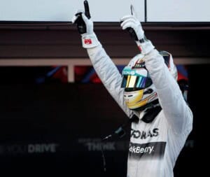 Lewis Hamilton celebrating his 2014 Russian GP win (credit: AP)