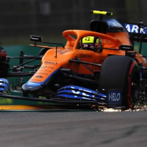 Lando Norris, McLaren MCL35M front on leaving corner.