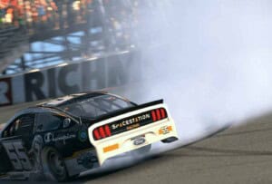 Vicente Salas does a burnout after winning the eNASCAR Coca-Cola iRacing Series race at Richmond, 4/13/2021