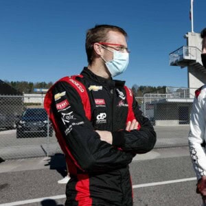 Sebastien Bourdais and Romain Grosjean have a chat during IndyCar preseason testin