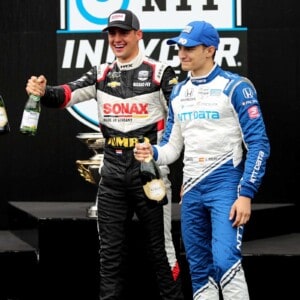 Rinua VeeKay, Romain Grosjean and Alex Palou celebrate their podium finishes at Indianapolis