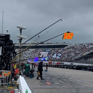 New Hampshire Motor Speedway had a rain delay Sunday after a NASCAR officiating call to keep the race under green caused Kyle Busch and other lead cars to wreck entering turns 1 and 2 (Photo: Amy Henderson)
