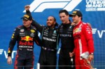 Race winner Lewis Hamilton of Great Britain and Mercedes GP, second placed Max Verstappen of Netherlands and Red Bull Racing and third placed Carlos Sainz of Spain and Ferrari celebrate on the podium during the F1 Grand Prix of Russia at Sochi Autodrom on September 26, 2021 in Sochi, Russia. (Photo by Yuri Kochetkov - Pool/Getty Images)