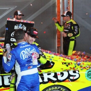 Ryan Blaney and Bubba Wallace hug after Blaney wins the 2022 NASCAR All-Star Race. (Photo: Rick Lunkenheimer)
