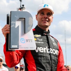 Will Power holding the NTT P1 Pole Award at Indianapolis