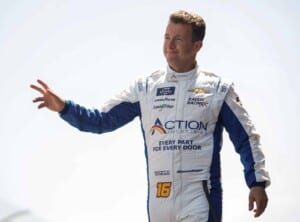 AJ Allmendinger waves in white firesuit, Sean Gardner/Getty Images