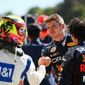 MONZA, ITALY - SEPTEMBER 11: Race winner Max Verstappen of the Netherlands and Oracle Red Bull Racing is congratulated by sixteenth placed Kevin Magnussen of Denmark and Haas F1 in parc ferme during the F1 Grand Prix of Italy at Autodromo Nazionale Monza on September 11, 2022 in Monza, Italy. (Photo by Dan Mullan/Getty Images via Red Bull Content Pool)