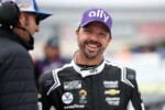 Josh Berry, driver of the #48 Ally Chevrolet, shares a laugh with crew chief Alan Gustafson on the grid during practice for the NASCAR Cup Series Würth 400 at Dover International Speedway on April 29, 2023 in Dover, Delaware. (Photo by James Gilbert/Getty Images)