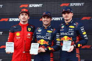 Sprint winner Sergio Perez of Mexico and Oracle Red Bull Racing (C), Second placed Charles Leclerc of Monaco and Ferrari (L) and Third placed Max Verstappen of the Netherlands and Oracle Red Bull Racing (R) pose for a photo in parc ferme during the Sprint ahead of the F1 Grand Prix of Azerbaijan at Baku City Circuit