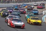 NASCAR Cup Series cars race at New Hampshire Motor Speedway. Photo: NKP