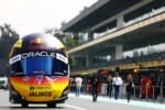 MEXICO CITY, MEXICO - OCTOBER 26: A buggy designed to look like the race helmet of Sergio Perez of Mexico and Oracle Red Bull Racing drives in the Pitlane during previews ahead of the F1 Grand Prix of Mexico at Autodromo Hermanos Rodriguez on October 26, 2023 in Mexico City, Mexico. (Photo by Mark Thompson/Getty Images) // Getty Images / Red Bull Content Pool //
