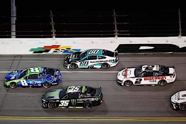 2025 Cup Daytona I pack racing V - Kyle Busch, No. 8 Richard Childress Racing Chevrolet, Ryan Preece, No. 60 RFK Racing Ford, and Riley Herbst, No. 35 23XI Racing Toyota (Credit: NKP)