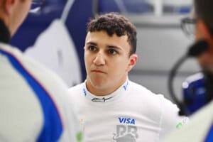 Isack Hadjar of France and Visa Cash App Racing Bulls looks on in the garage during day one of F1 Testing at Bahrain International Circuit on February 26, 2025 in Bahrain, Bahrain. (Photo by Rudy Carezzevoli/Getty Images)