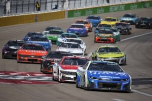 Daniel Suarez, driver of the #99 Freeway Insurance Chevrolet, leads Josh Berry, driver of the #21 Motorcraft/Quick Lane Ford, during the NASCAR Cup Series Pennzoil 400 at Las Vegas Motor Speedway on March 16, 2025 in Las Vegas, Nevada. (Photo by Chris Graythen/Getty Images)