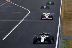 Yuki Tsunoda, driving for Red Bull Racing, leads Liam Lawson, driving for Racing Bulls, during the 2025 F1 Japanese Grand Prix.