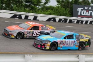 2025 ARCA East Nashville Fairgrounds side-by-side racing - Becca Monopoli, No. 85 City Garage Motorsports Ford, and Jeff Maconi, No. 86 Clubb Racing Inc. Ford (Credit: Reid Scott)
