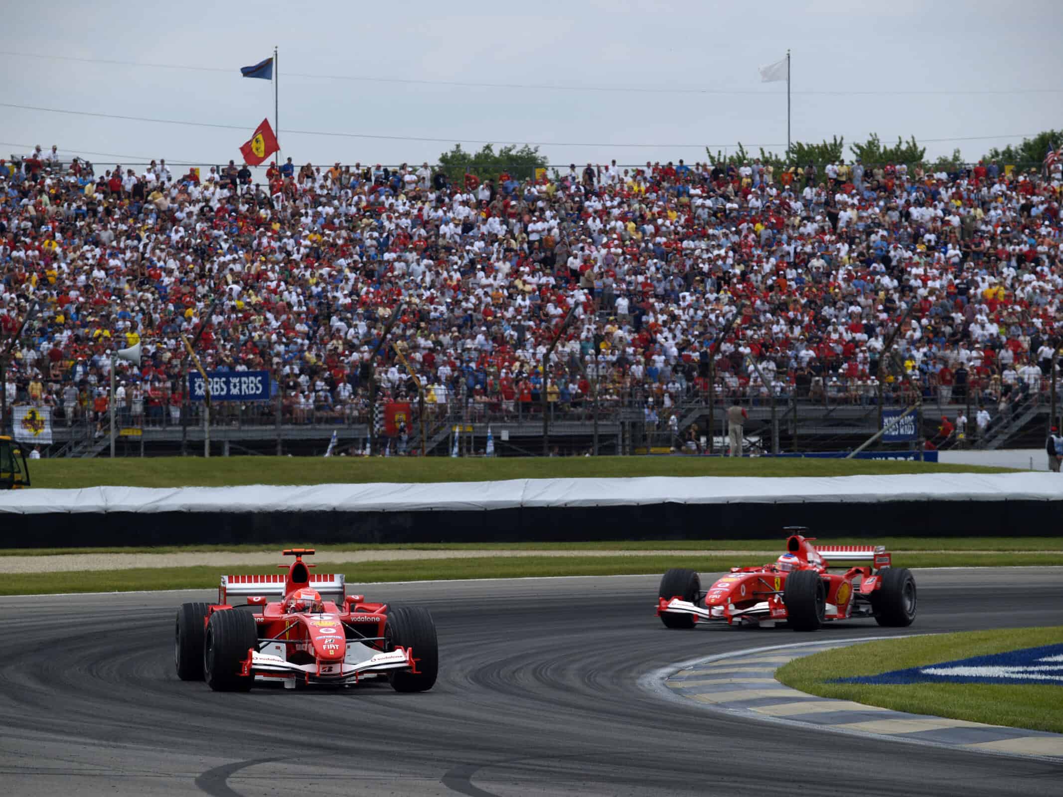 Ferrari teammates Michael Schumacher and Rubens Barrichello pace the field during F1's 2005 United States Grand Prix at Indianapolis Motor Speedway.