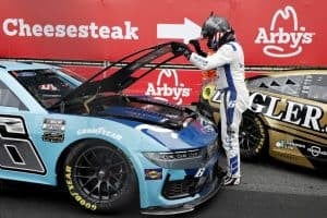 Brad Keselowski, driver of the #6 Kroger/Blue Buffalo Ford, looks under the hood after an on-track incident during the NASCAR Cup Series Grant Park 165 at Chicago Street Course on July 06, 2025 in Chicago, Illinois. (Photo by Logan Riely/Getty Images)