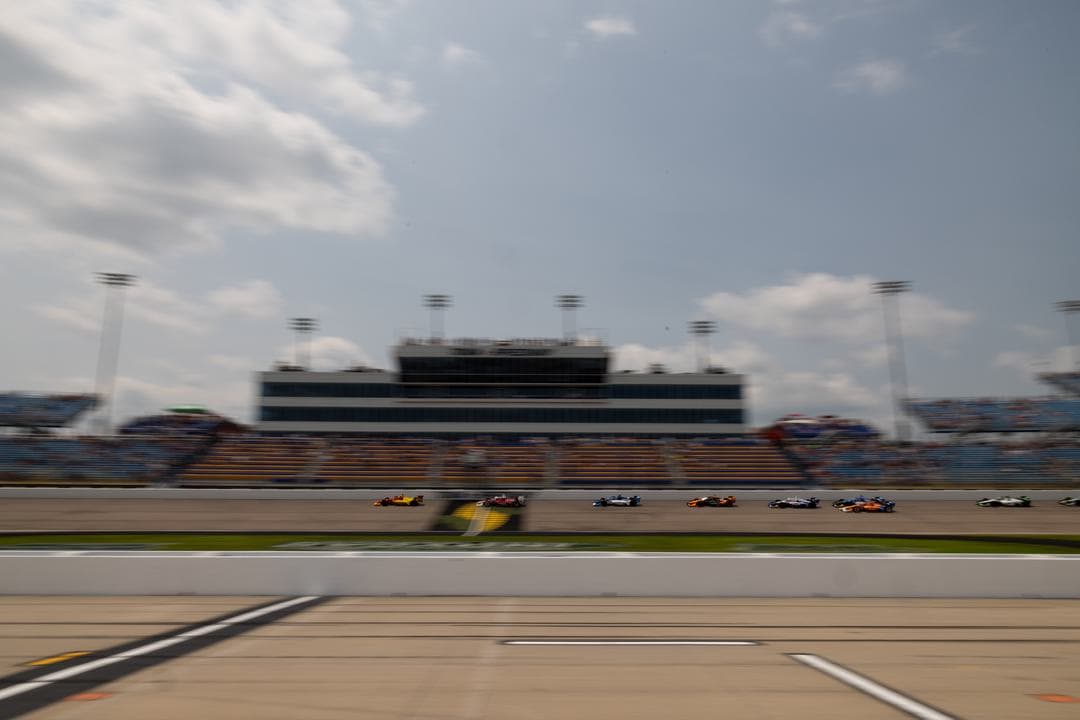 The NTT IndyCar Series field races at Iowa Speedway during the 2025 doubleheader weekend.
