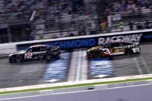 Austin Dillon, driver of the #3 Bass Pro/Winchester Chevrolet, and Ryan Blaney, driver of the #12 BodyArmor Sports Drink Ford, race during the NASCAR Cup Series Cook Out 400 at Richmond Raceway on August 16, 2025 in Richmond, Virginia. (Photo by Samuel Corum/Getty Images)