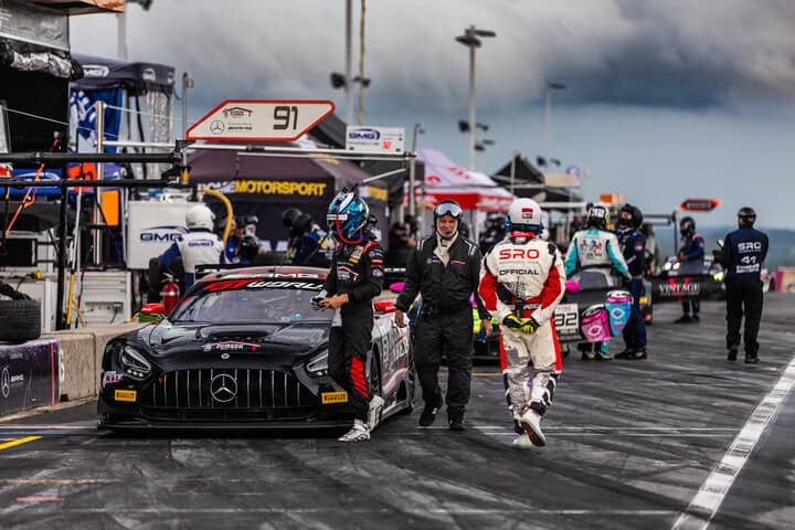 Philip Ellis walks away from his car during a lightning delay in GT World Challenge America powered by AWS Race No. 1 at Road America, 8/16/2025 (Photo: Fabian Lagunas/SRO Motorsports Group)