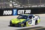 Aric Almirola races for Joe Gibbs Racing during the 2025 NASCAR Xfinity Series Food City 300 at Bristol Motor Speedway.