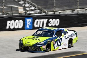 Aric Almirola races for Joe Gibbs Racing during the 2025 NASCAR Xfinity Series Food City 300 at Bristol Motor Speedway.