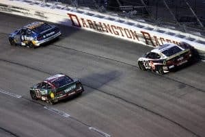 Ryan Preece, driver of the #60 Trimble Ford, Chris Buescher, driver of the #17 Kroger/Tree Top Ford, and Christopher Bell, driver of the #20 Rheem Toyota, race during the NASCAR Cup Series Cook Out Southern 500 at Darlington Raceway on August 31, 2025 in Darlington, South Carolina. (Photo by Logan Riely/Getty Images)