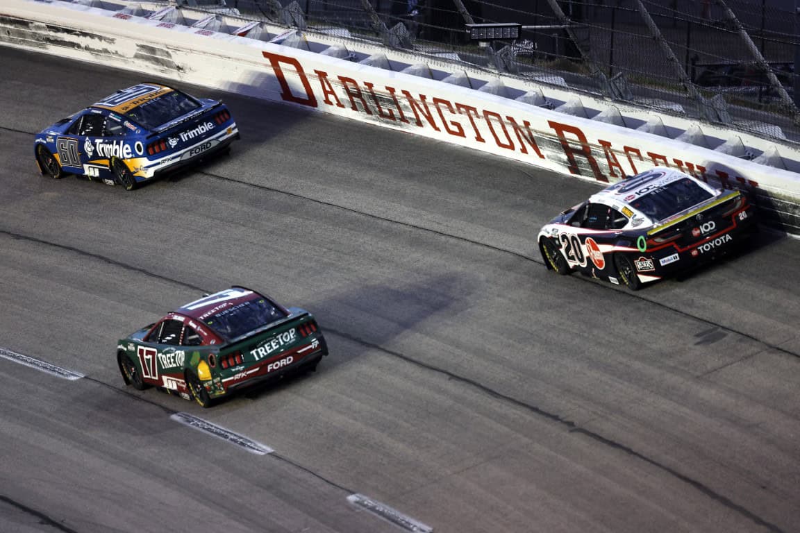 Ryan Preece, driver of the #60 Trimble Ford, Chris Buescher, driver of the #17 Kroger/Tree Top Ford, and Christopher Bell, driver of the #20 Rheem Toyota, race during the NASCAR Cup Series Cook Out Southern 500 at Darlington Raceway on August 31, 2025 in Darlington, South Carolina. (Photo by Logan Riely/Getty Images)