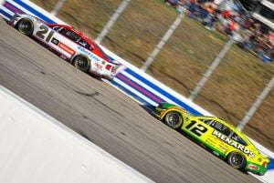 2025 Cup New Hampshire racing - Josh Berry, No. 21 Wood Brothers Racing Ford, and Ryan Blaney, No. 12 Team Penske Ford (Credit: Chase Folsom)