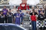 Denny Hamlin, driver of the #11 ampm Toyota, and crew celebrate in victory lane after winning the NASCAR Cup Series South Point 400 at Las Vegas Motor Speedway on October 12, 2025 in Las Vegas, Nevada. (Photo by Logan Riely/Getty Images)