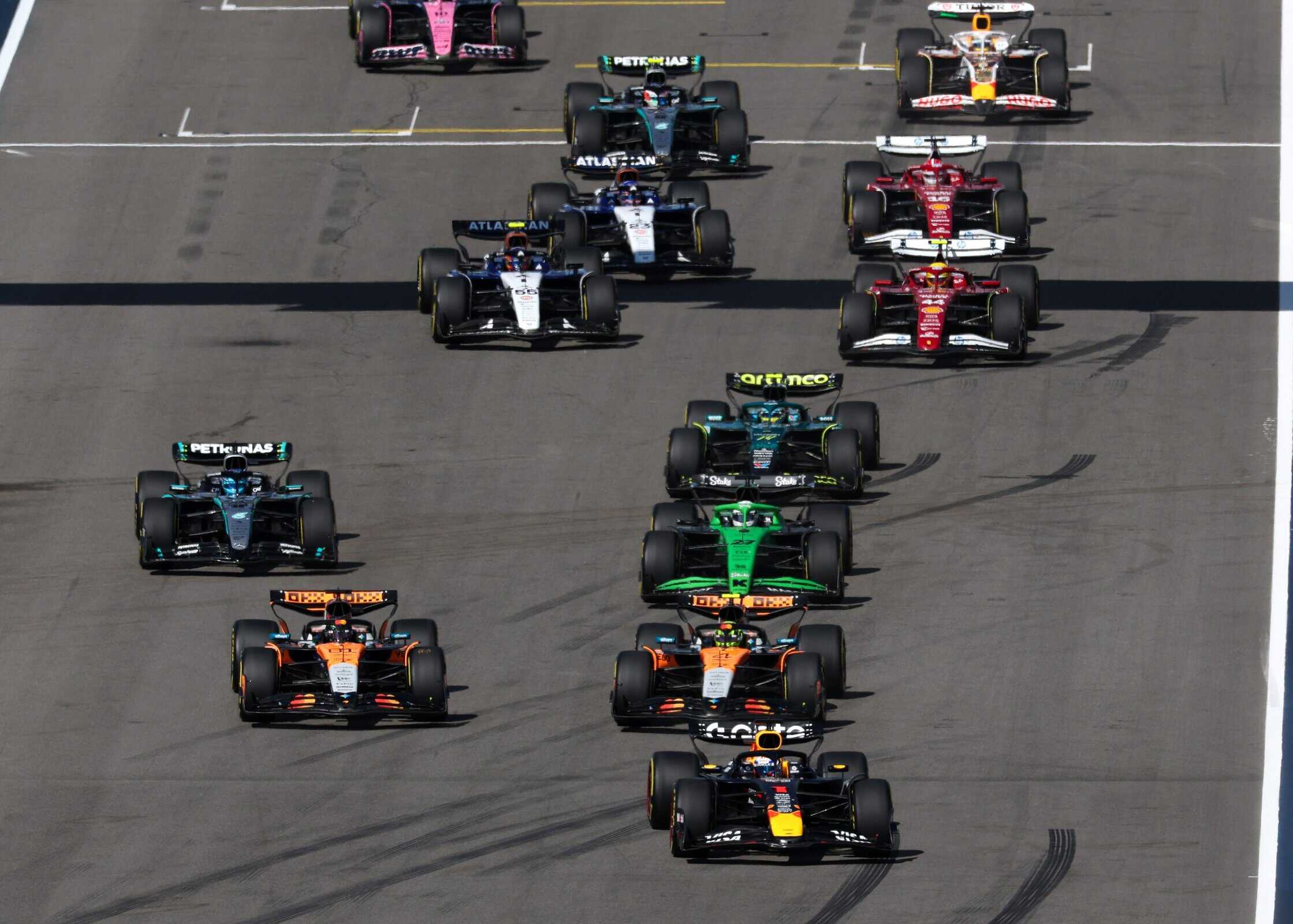 Max Verstappen leads Lando Norris and Oscar Piastri off the line for the F1 Sprint at the United States Grand Prix.