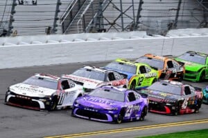 #11: Denny Hamlin, Joe Gibbs Racing, National Debt Relief Toyota Camry, #23: Bubba Wallace, 23XI Racing, Xfinity Toyota Camry, #2: Austin Cindric, Team Penske, Discount Tire Ford Mustang, #45: Tyler Reddick, 23XI Racing, Chumba Casino Toyota Camry, and #12: Ryan Blaney, Team Penske, MenardsPeak Ford Mustang