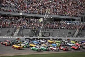 Chase Briscoe, driver of the #19 Bass Pro Shops Toyota, and Joey Logano, driver of the #22 Shell Pennzoil Ford, lead the field during the NASCAR Cup Series Daytona 500 at Daytona International Speedway on February 15, 2026 in Daytona Beach, Florida. (Photo by James Gilbert/Getty Images)