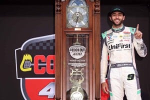 Chase Elliott with the Grandfather clock after winning at Martinsville
