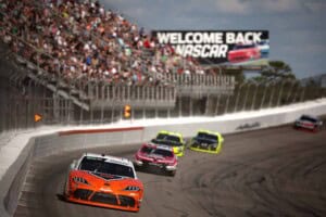 William Sawalich, driver of the #18 Soundgear Toyota, leads the field during the NASCAR O'Reilly Auto Parts Series North Carolina Education Lottery 250 Presented by Black's Tire at Rockingham Speedway on April 04, 2026 in Rockingham, North Carolina. (Photo by James Gilbert/Getty Images)