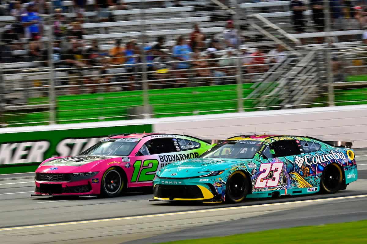 #12: Ryan Blaney, Team Penske, BODYARMOR FLASH I.V. Ford Mustang and #23: Bubba Wallace, 23XI Racing, Columbia PFG/Academy Sports Toyota Camry