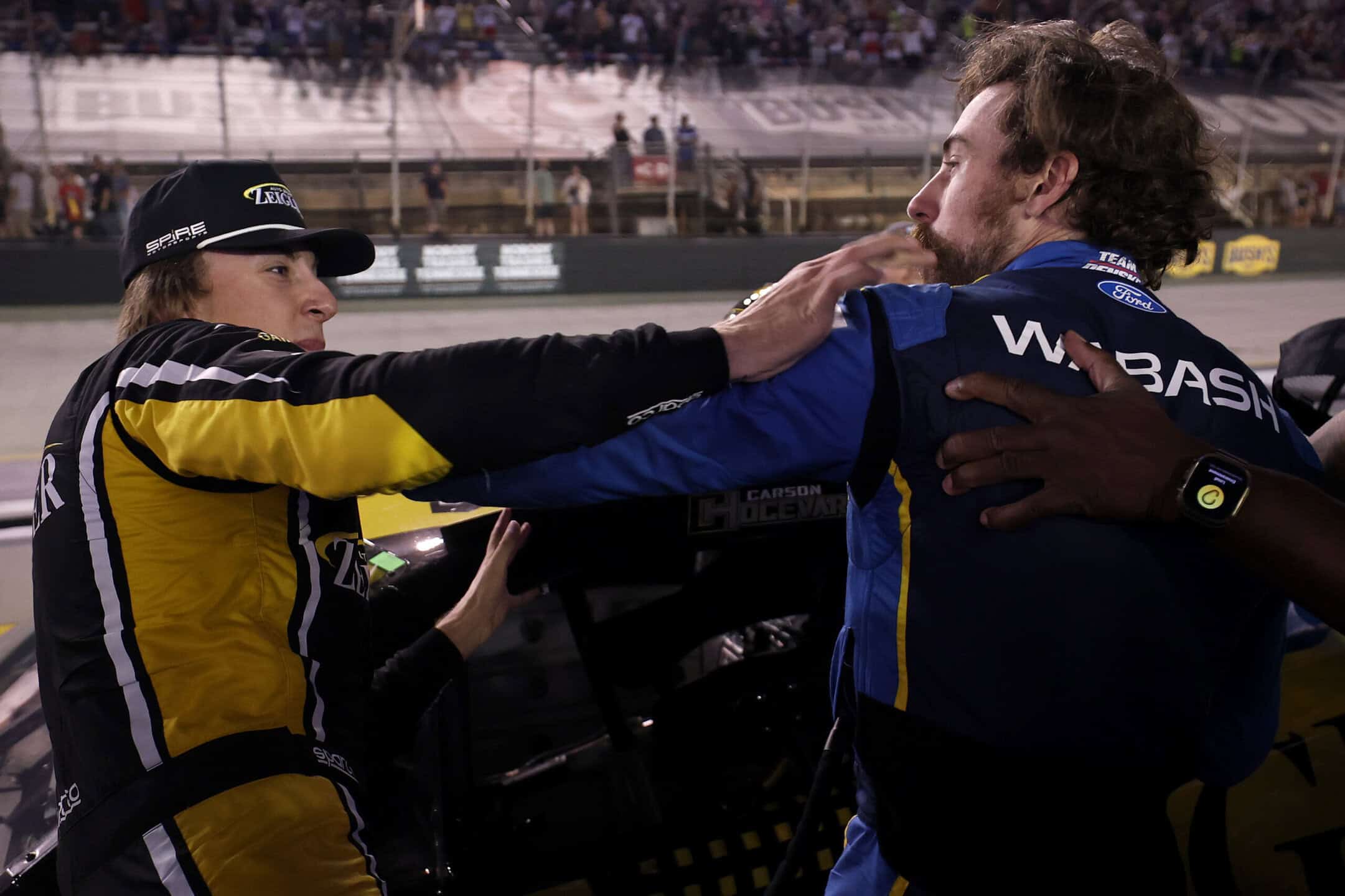 BRISTOL, TENNESSEE - SEPTEMBER 19: Carson Hocevar, driver of the #77 Zeigler Auto Group Chevrolet, (L) and Ryan Blaney, driver of the #12 WABASH Ford, get into an altercation after the NASCAR Cup Series Bass Pro Shops Night Race at Bristol Motor Speedway on September 19, 2026 in Bristol, Tennessee. (Photo by Chris Graythen/Getty Images)