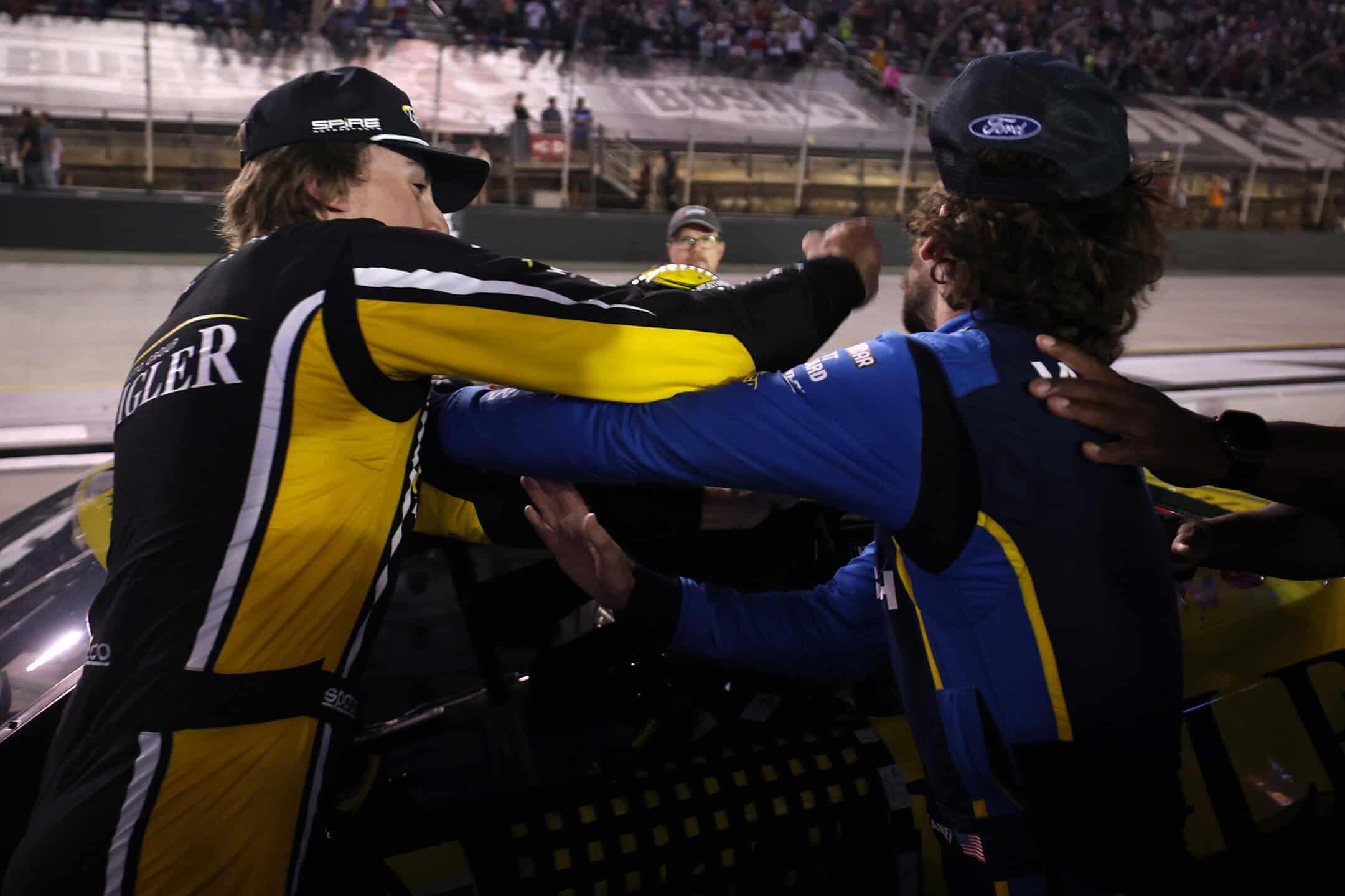BRISTOL, TENNESSEE - SEPTEMBER 19: Carson Hocevar, driver of the #77 Zeigler Auto Group Chevrolet, (L) and Ryan Blaney, driver of the #12 WABASH Ford, get into an altercation after the NASCAR Cup Series Bass Pro Shops Night Race at Bristol Motor Speedway on September 19, 2026 in Bristol, Tennessee. (Photo by Chris Graythen/Getty Images)