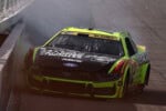 MADISON, ILLINOIS - SEPTEMBER 13: Ryan Blaney, driver of the #12 Menards/ATLAS Designer Shingles Ford, spins into the wall after an on-track incident during the NASCAR Cup Series Enjoy Illinois 300 at WWT Raceway on September 13, 2026 in Madison, Illinois.